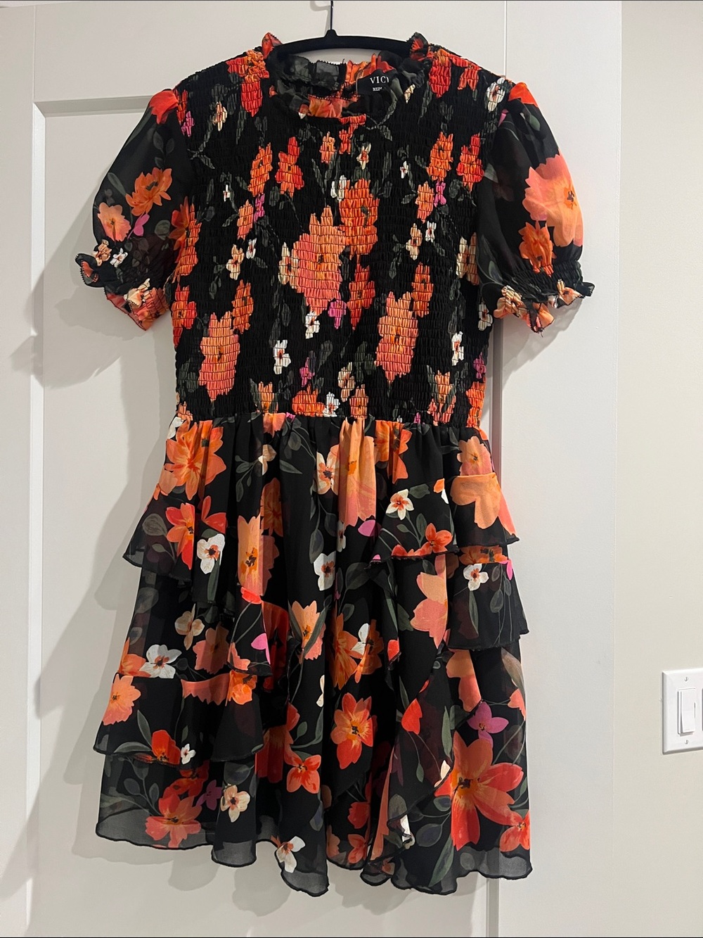 Vici Black Floral Tiered Ruffle Dress with Orange and Pink Accents